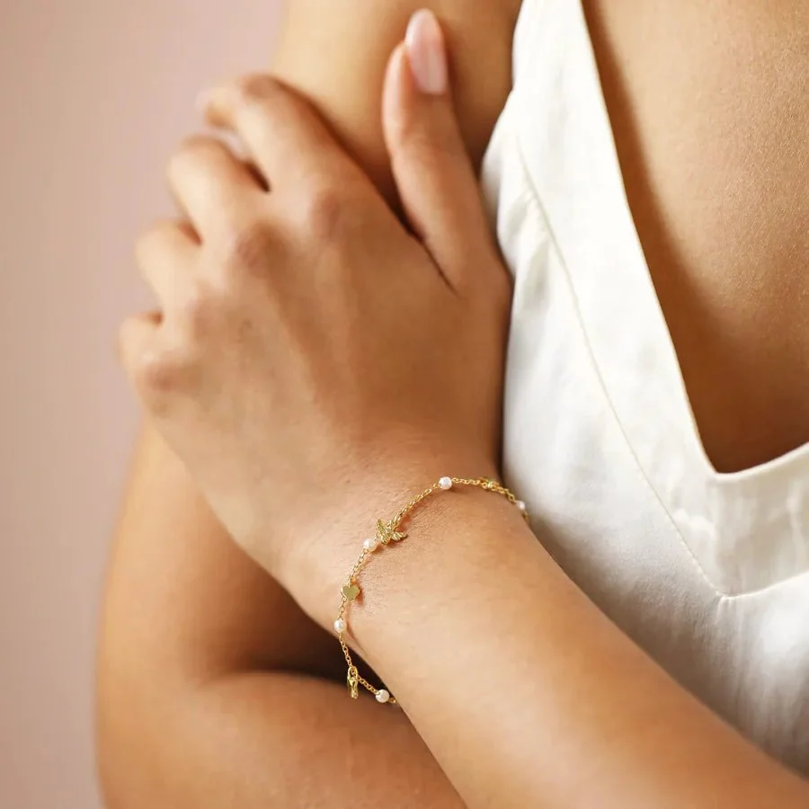 Lisa Angel Bee, Pearl, Butterfly and Heart Charm Bracelet in Gold - Image 4